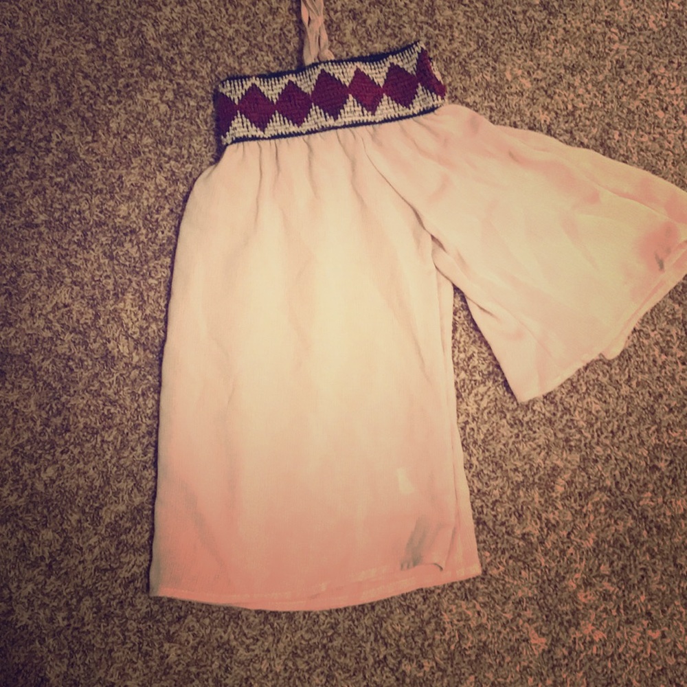 Off the shoulder cream top with Aztec details!